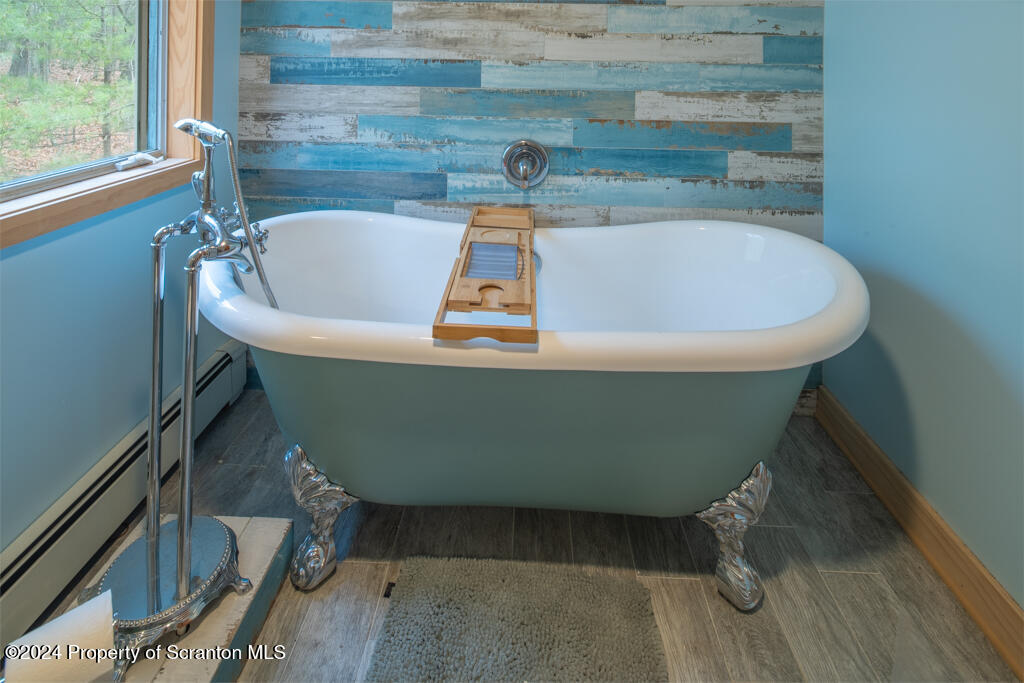 106 Rim Rock Road Milford, PA 18337 - Photo 20 of 32 a close up of a bathtub