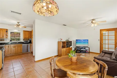 a kitchen with sink and stove