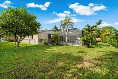 a view of a house with a big yard