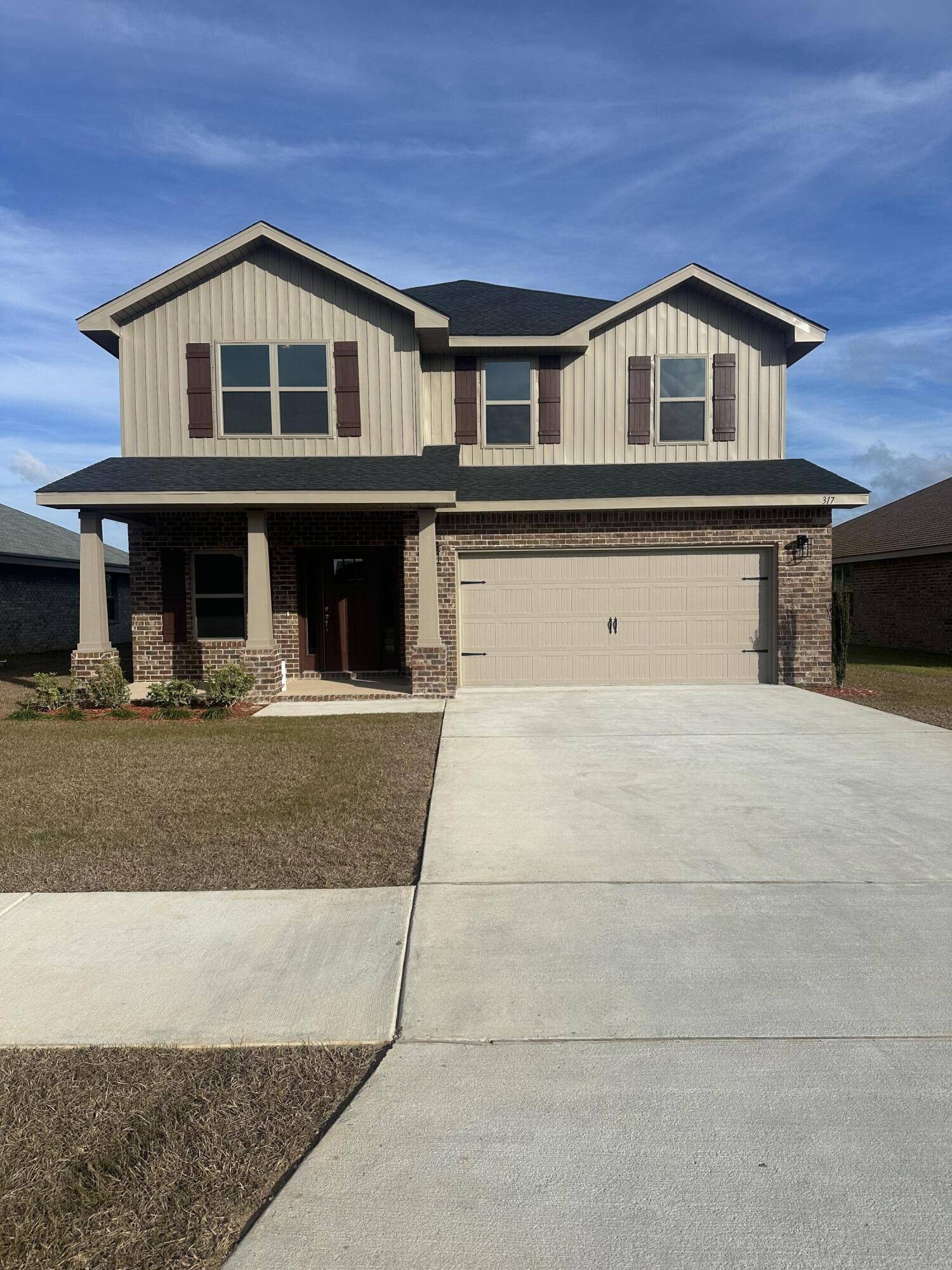 193 Ridgeway Circle Crestview, FL 32536 - Photo 1 of 33 a front view of a house with garage