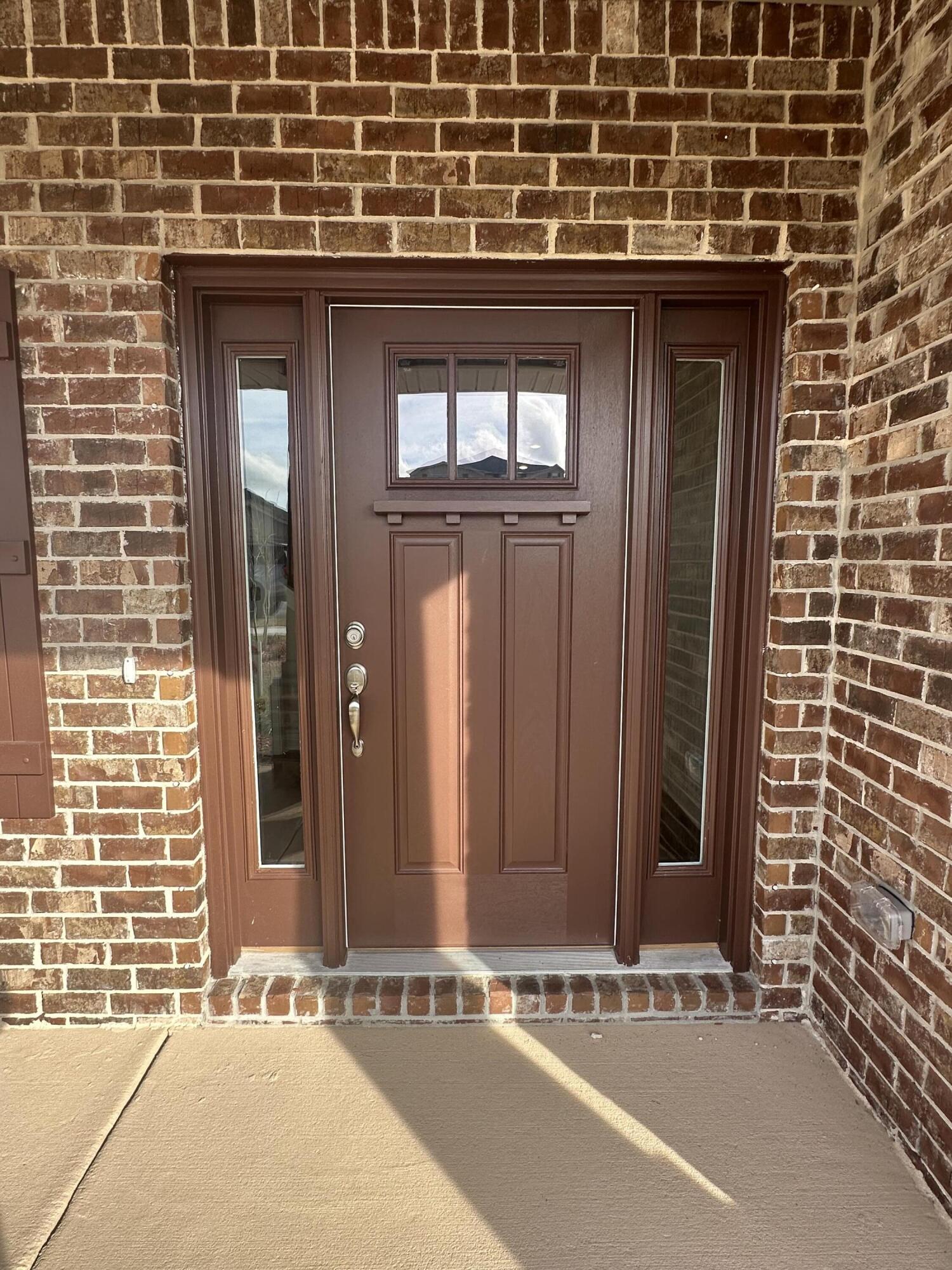193 Ridgeway Circle Crestview, FL 32536 - Photo 3 of 33 a view of a door and brick wall