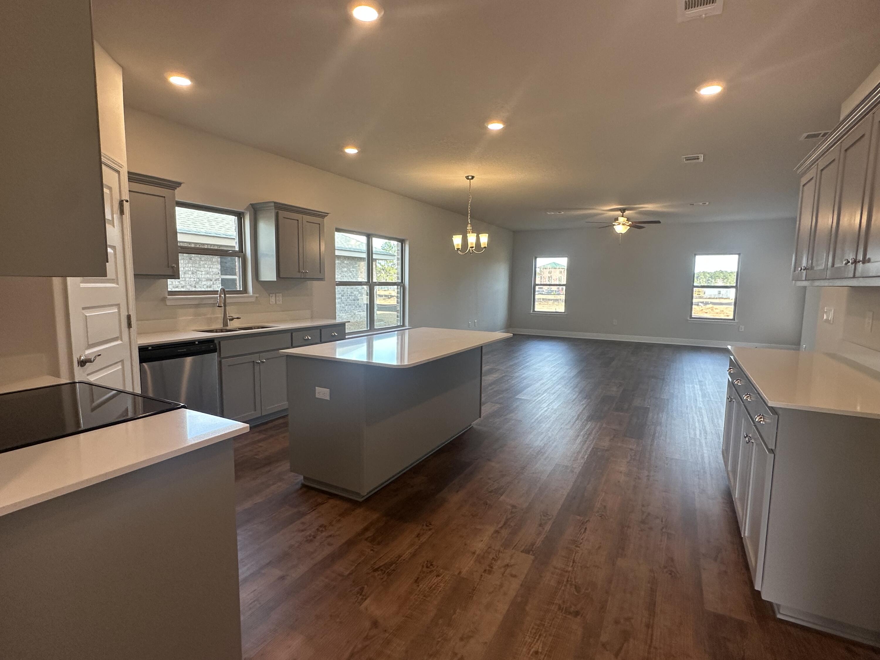 193 Ridgeway Circle Crestview, FL 32536 - Photo 6 of 33 a view of kitchen with sink and wooden floor