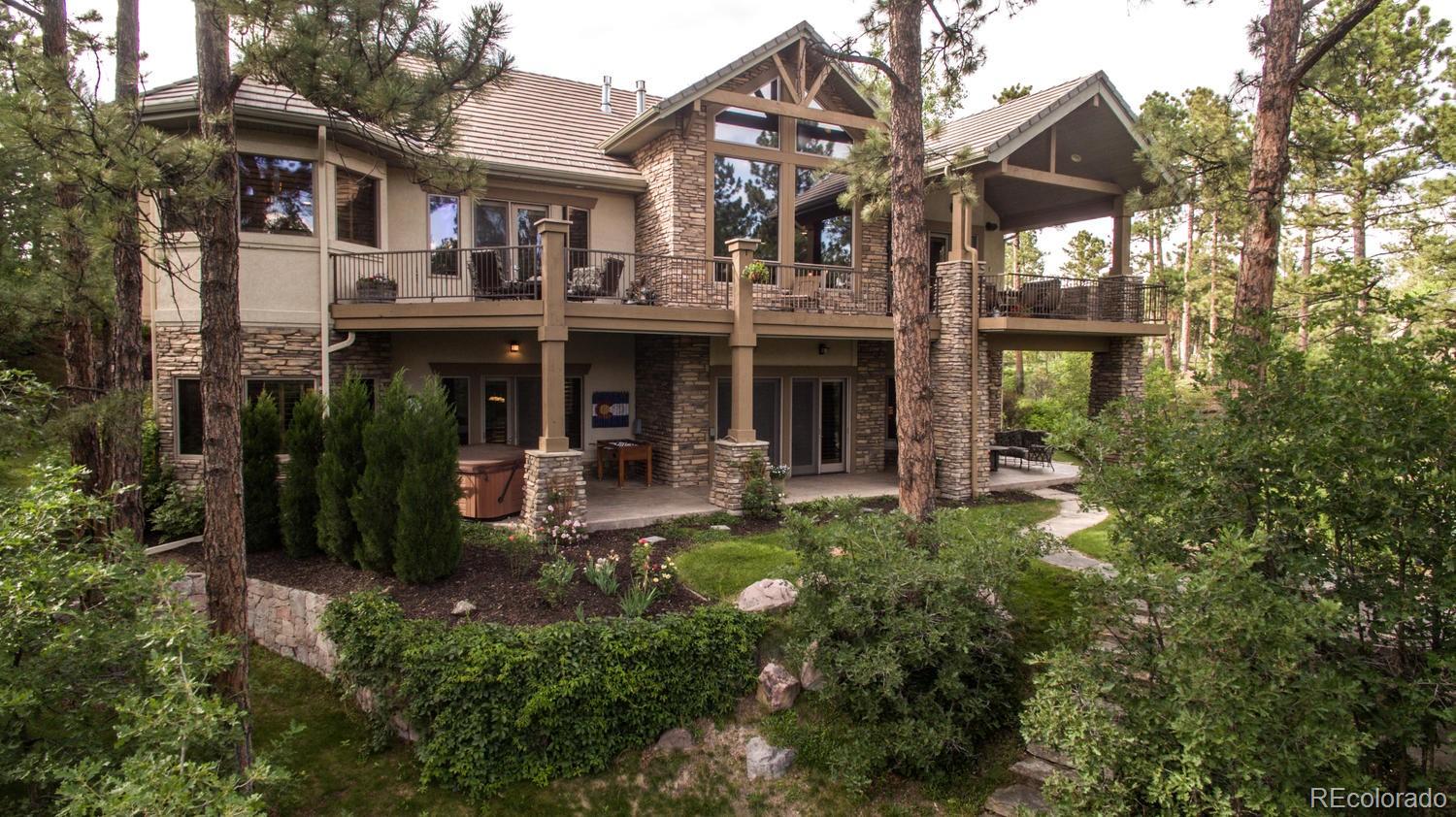 646 Ruby Trust Drive Castle Rock, CO 80108 - Photo 12 of 35 a view of a building with a garden