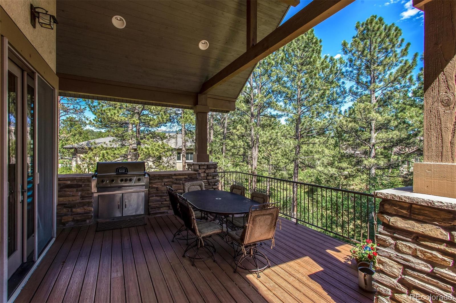 646 Ruby Trust Drive Castle Rock, CO 80108 - Photo 16 of 35 a view of a balcony with furniture and wooden floor