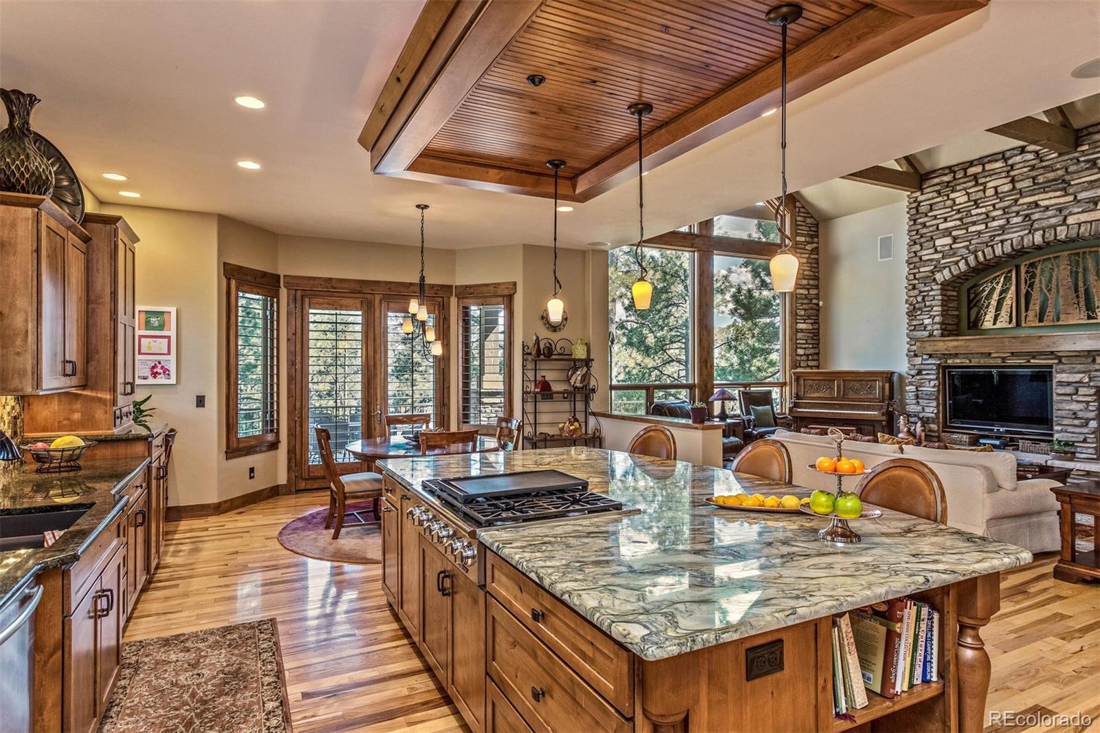 646 Ruby Trust Drive Castle Rock, CO 80108 - Photo 20 of 35 a kitchen with sink stove and view living room