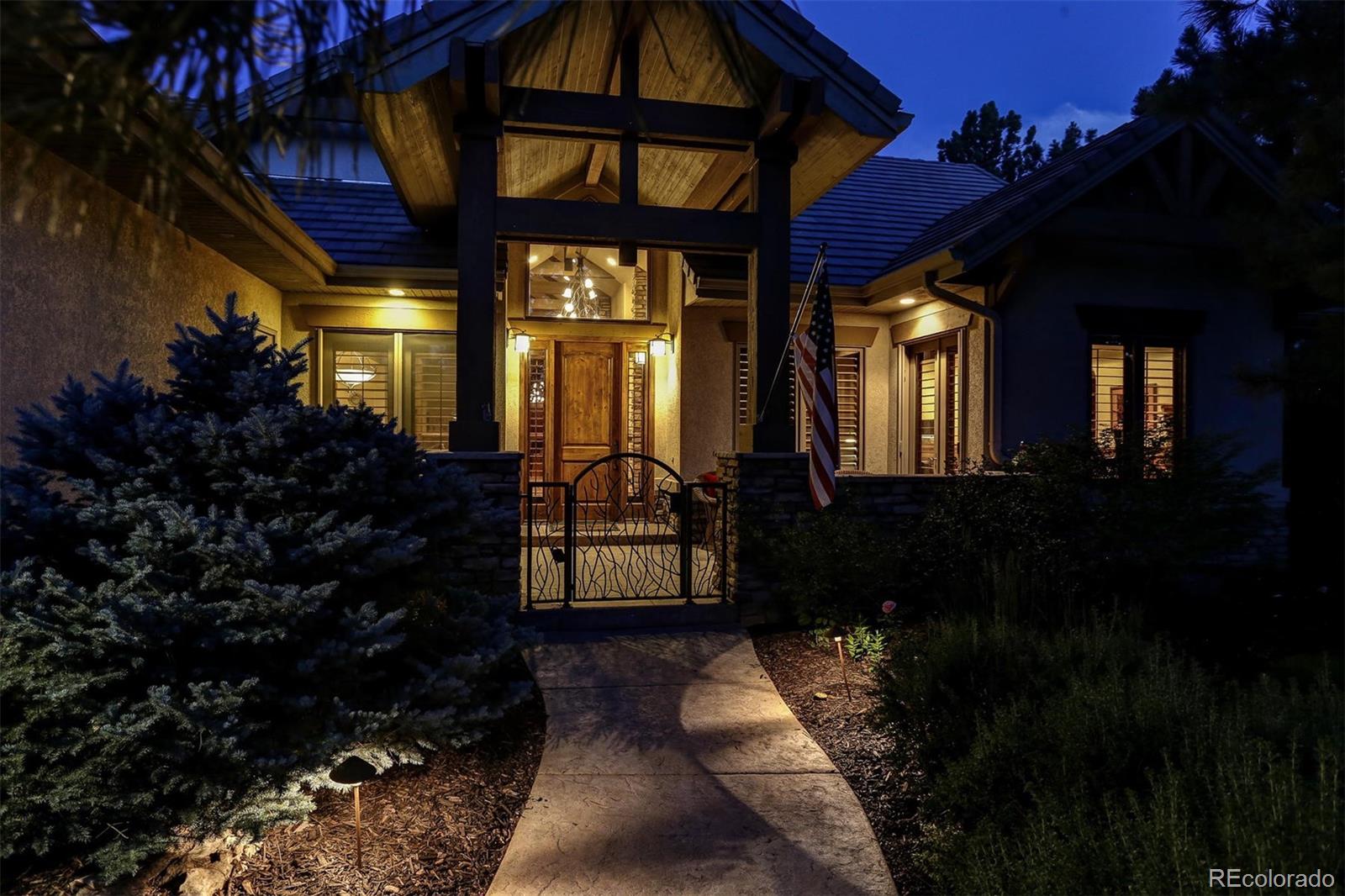 646 Ruby Trust Drive Castle Rock, CO 80108 - Photo 2 of 35 a view of a house with a backyard