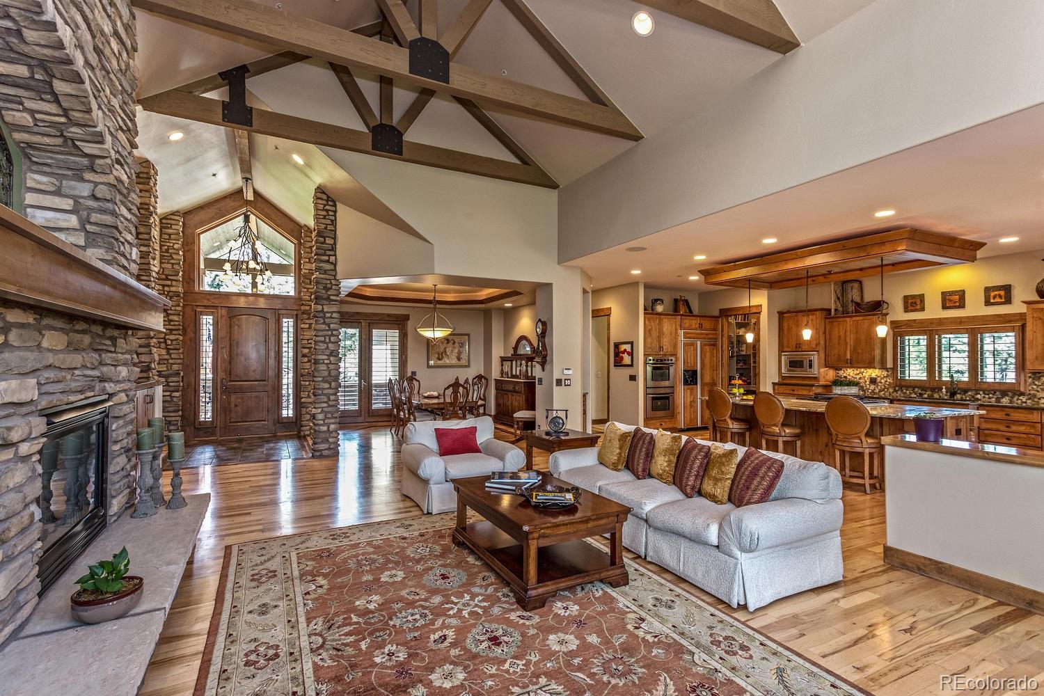 646 Ruby Trust Drive Castle Rock, CO 80108 - Photo 32 of 35 a roof deck with table and chairs