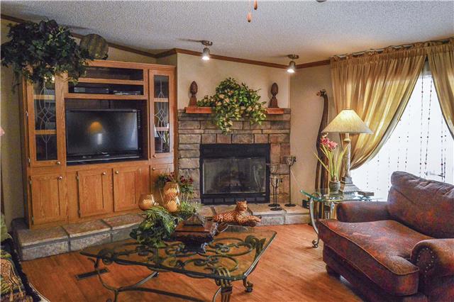 627 Bodenham Road Pulaski, TN 38478 - Photo 7 of 20 Living room. This great room offers plenty of space for your family and has a nice gas fireplace.