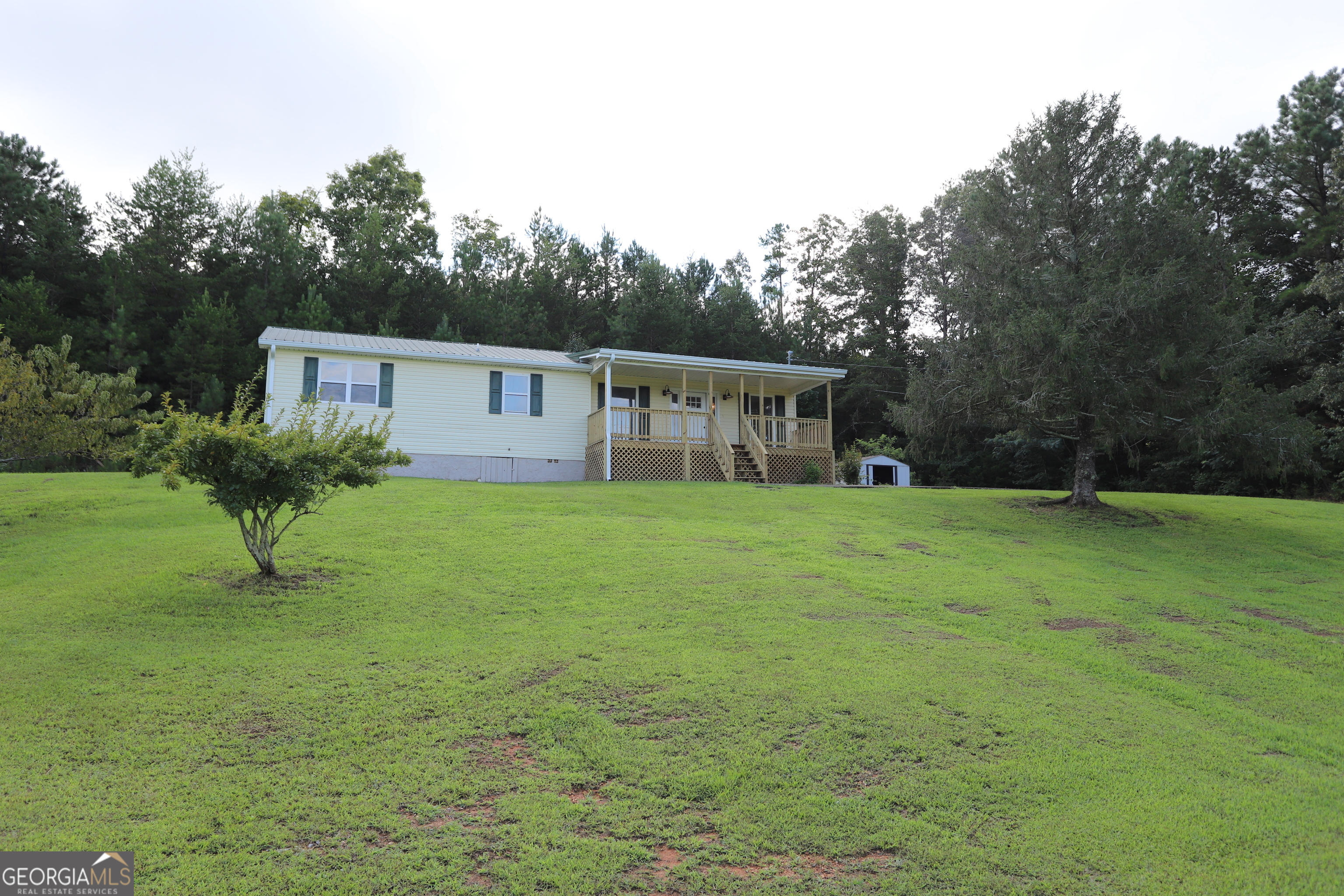 584 Stoleman Road Trion, GA 30753 - Photo 1 of 1 a house view with a garden space
