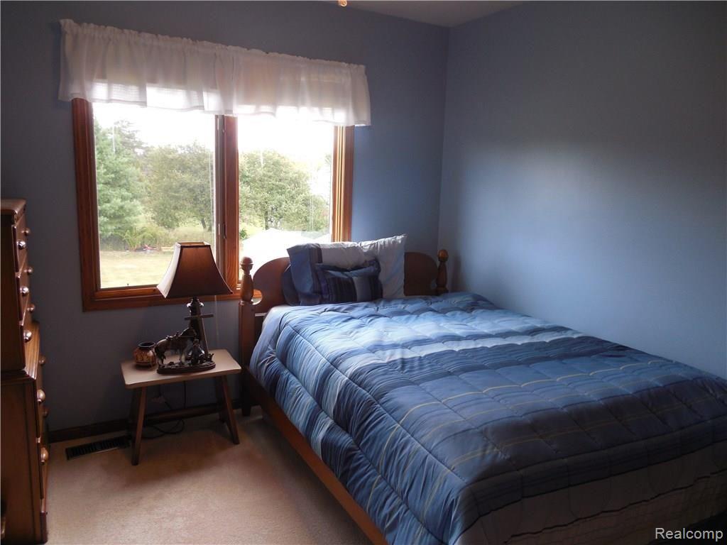 3955 Innisfree Road Howell, MI 48855 - Photo 17 of 43 Bedroom, the bed and dresser stays.
