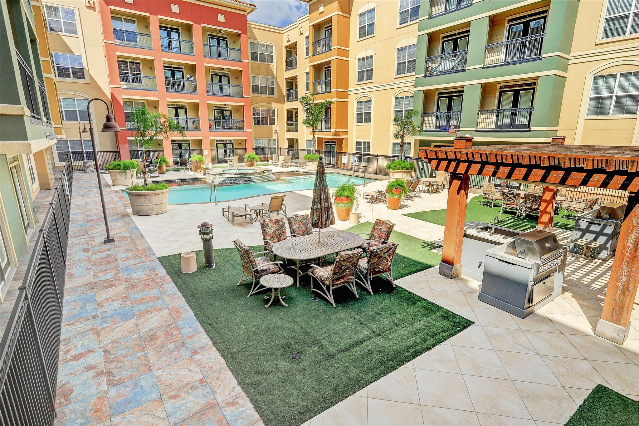 1711 Old Spanish Trail, Unit 448 Houston, TX 77054 - Photo 14 of 29 a garden view with a sitting space