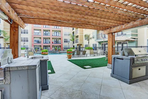 a living room filled with furniture and a garden