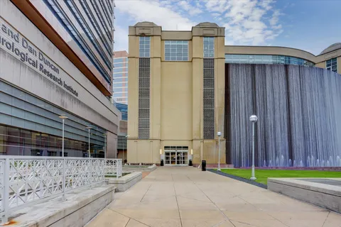 a multi story building with many windows