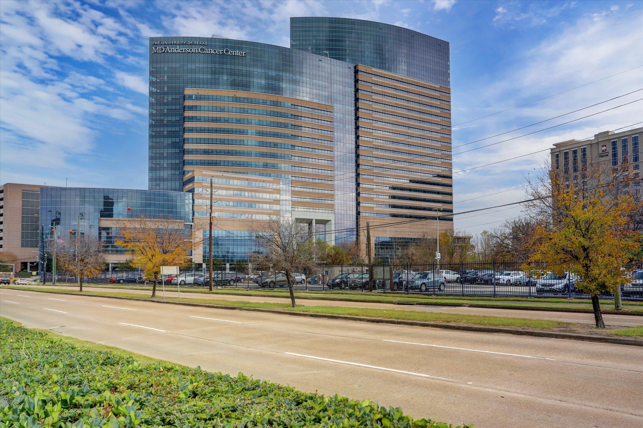 1711 Old Spanish Trail, Unit 448 Houston, TX 77054 - Photo 26 of 29 a building with trees in front of it