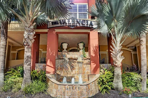 a view of a tall building with a outdoor space