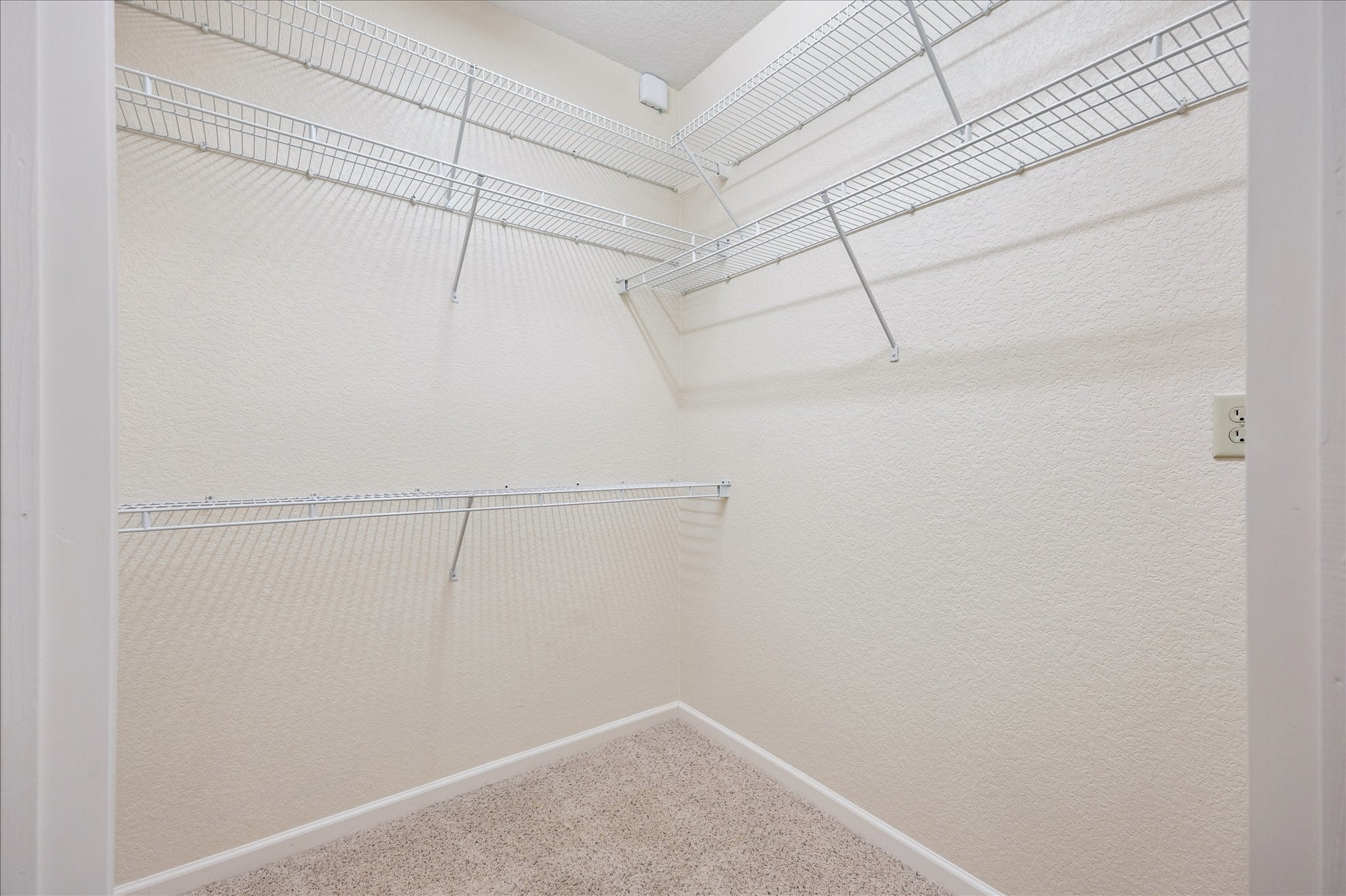 1711 Old Spanish Trail, Unit 448 Houston, TX 77054 - Photo 9 of 29 a view of a room with racks on the wall