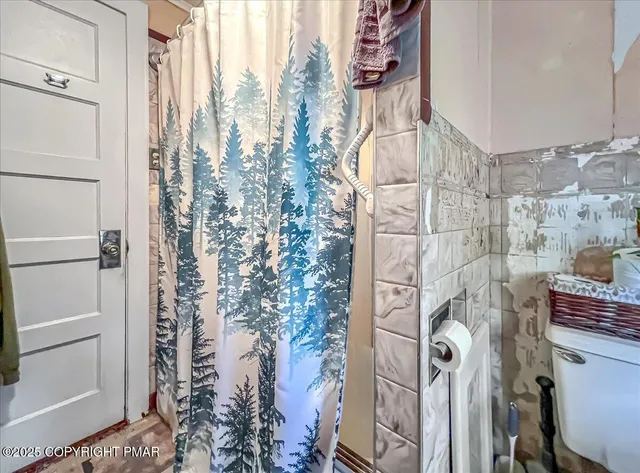 a view of a city from a corridor