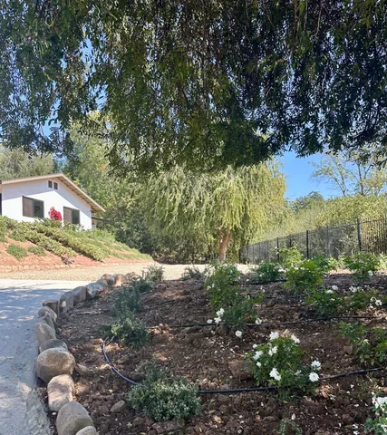 a house view with a backyard space