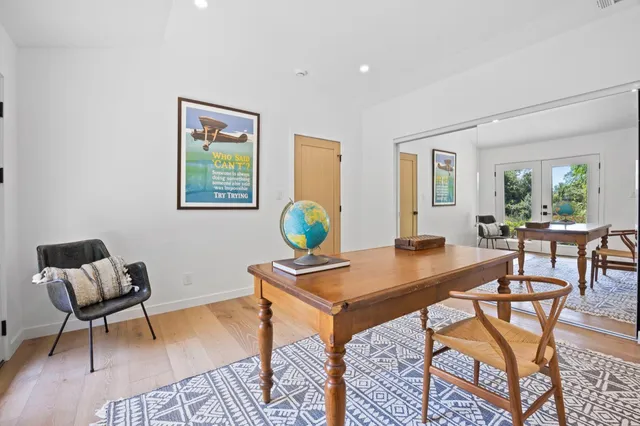 a workspace with furniture and window