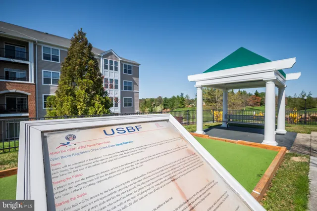 a view of swimming pool with a yard