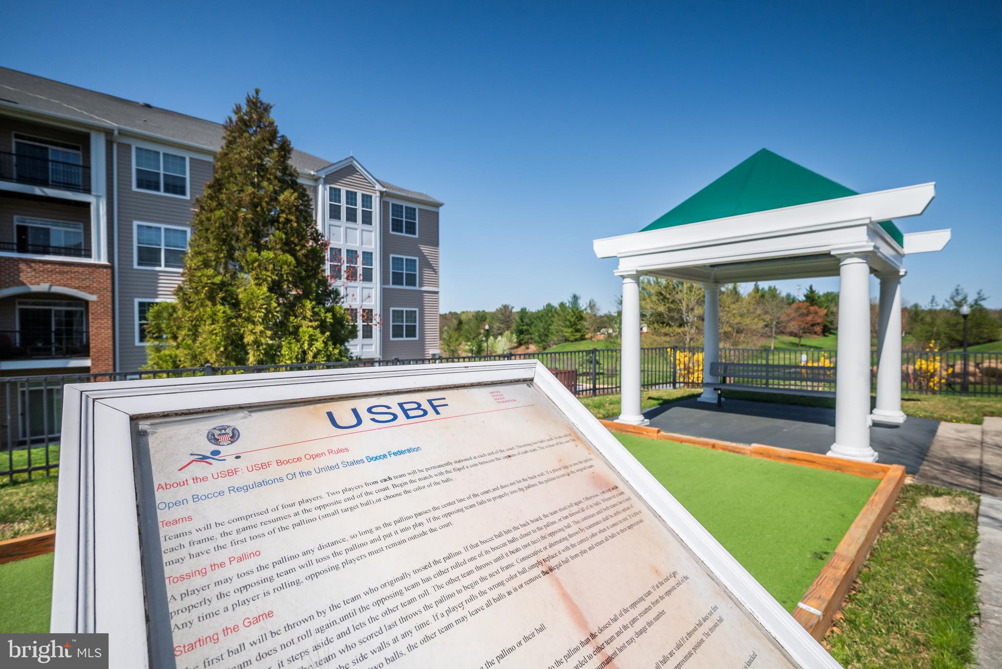 8615 Wandering Fox Trail, Unit 208 Odenton, MD 21113 - Photo 21 of 22 a view of swimming pool with a yard