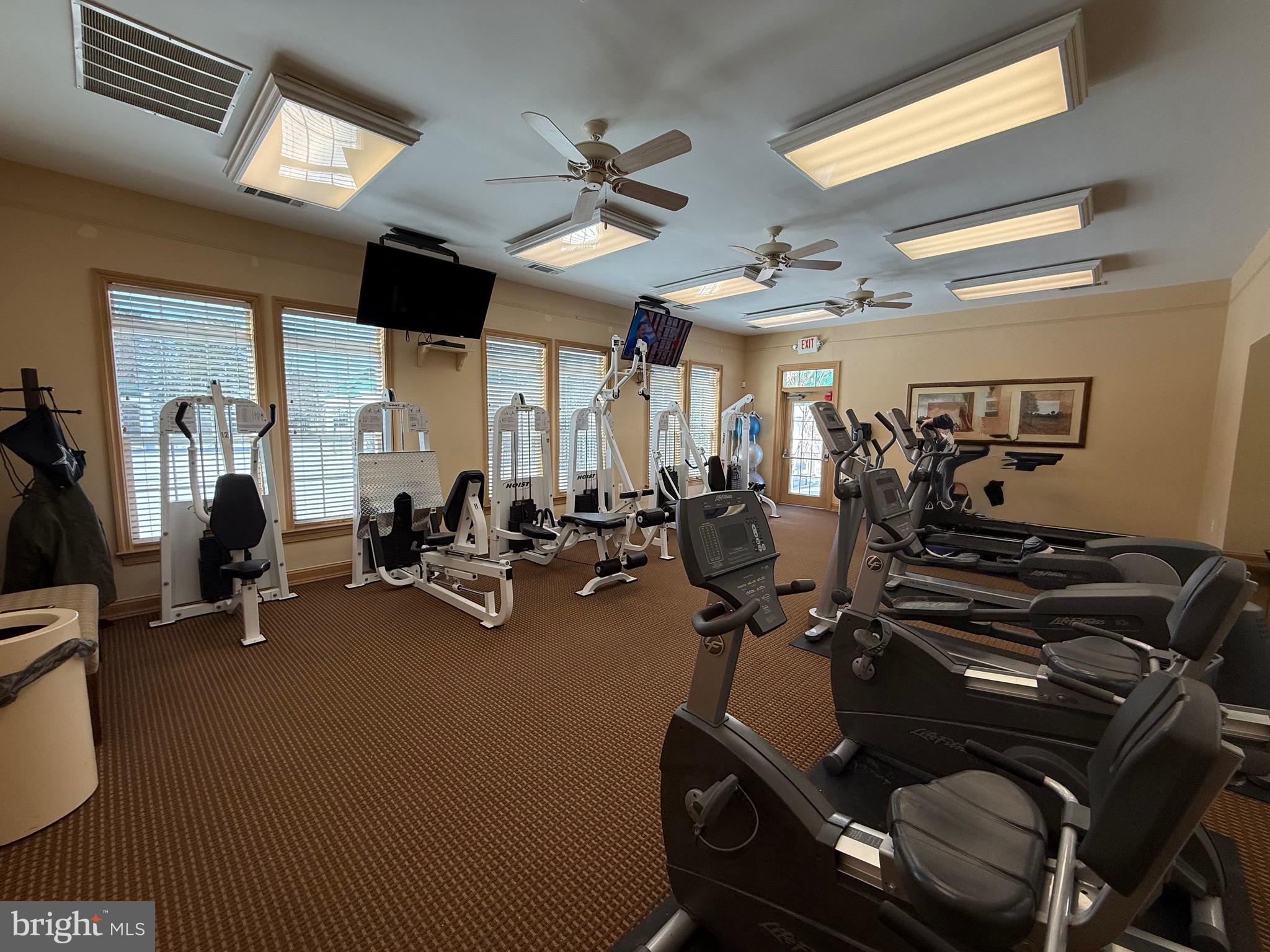 8615 Wandering Fox Trail, Unit 208 Odenton, MD 21113 - Photo 24 of 28 a view of a room with gym equipment