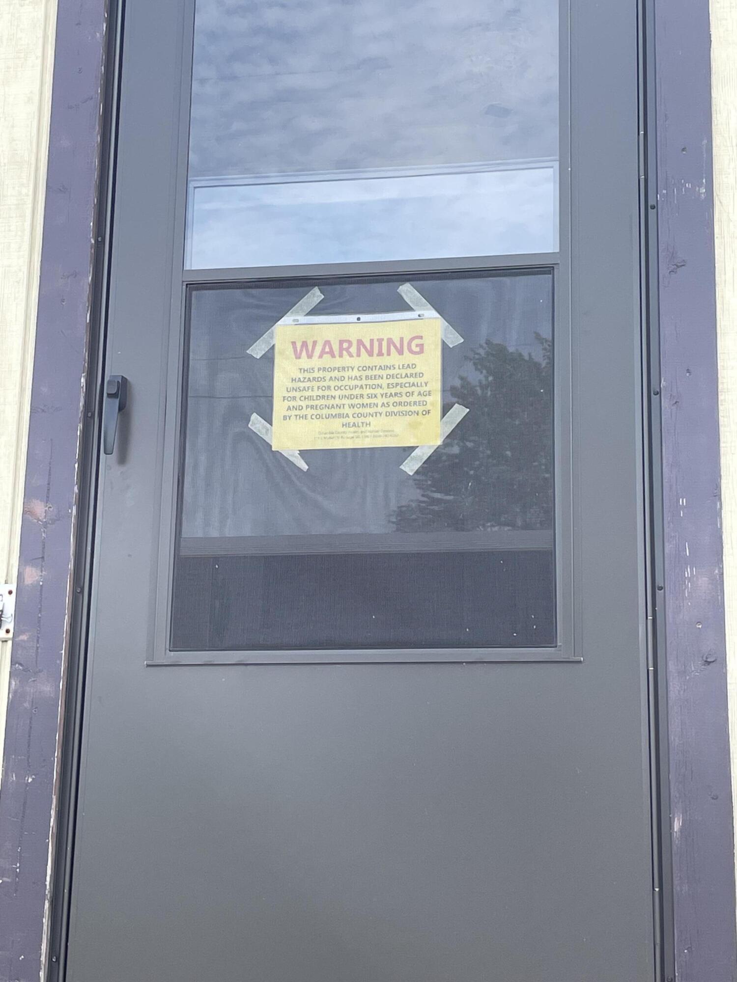 412 Manning Street Columbus, WI 53925 - Photo 5 of 45 Warning Sign