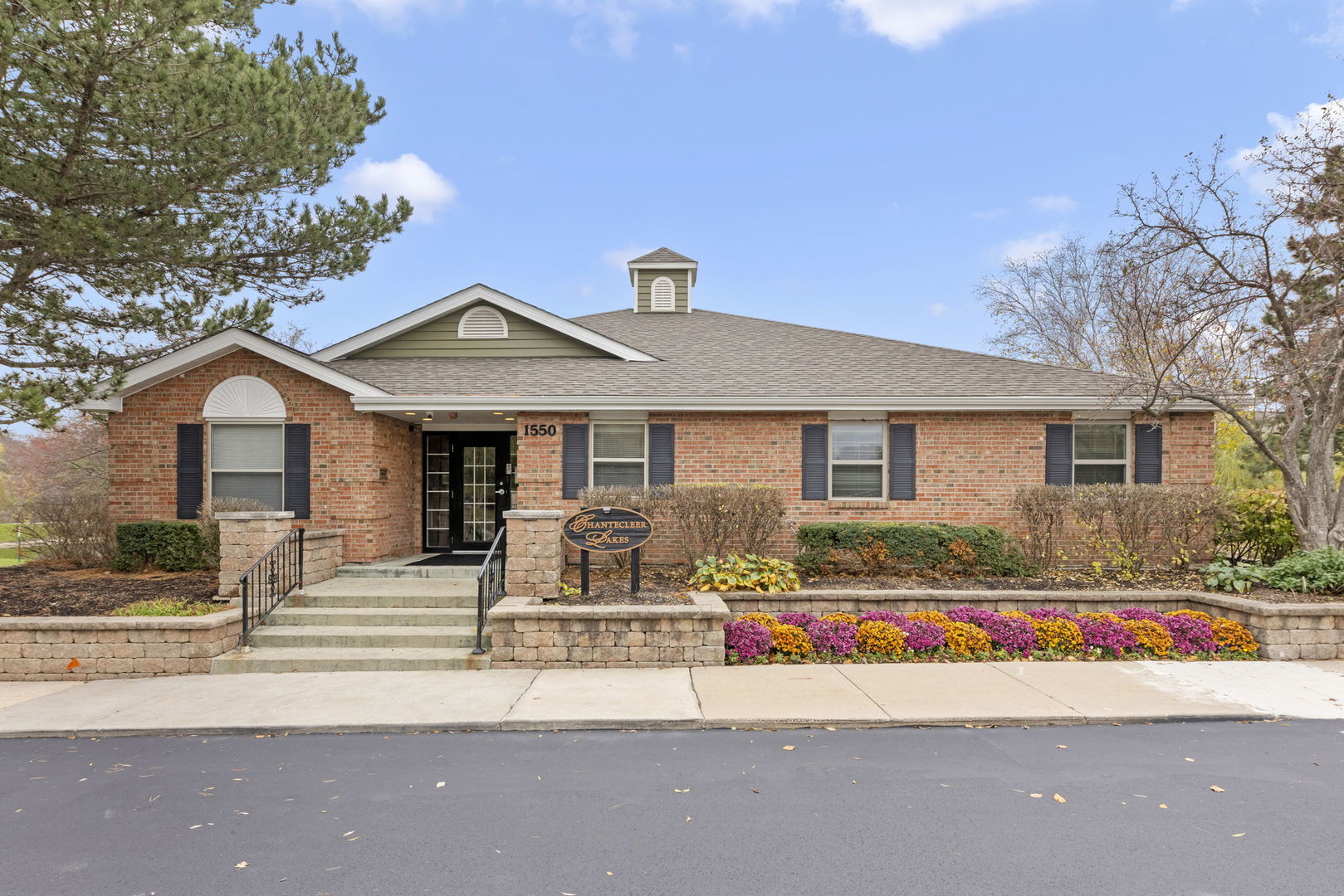 1324 McDowell Road, Unit 104 Naperville, IL 60563 - Photo 14 of 20 a front view of a house with a yard