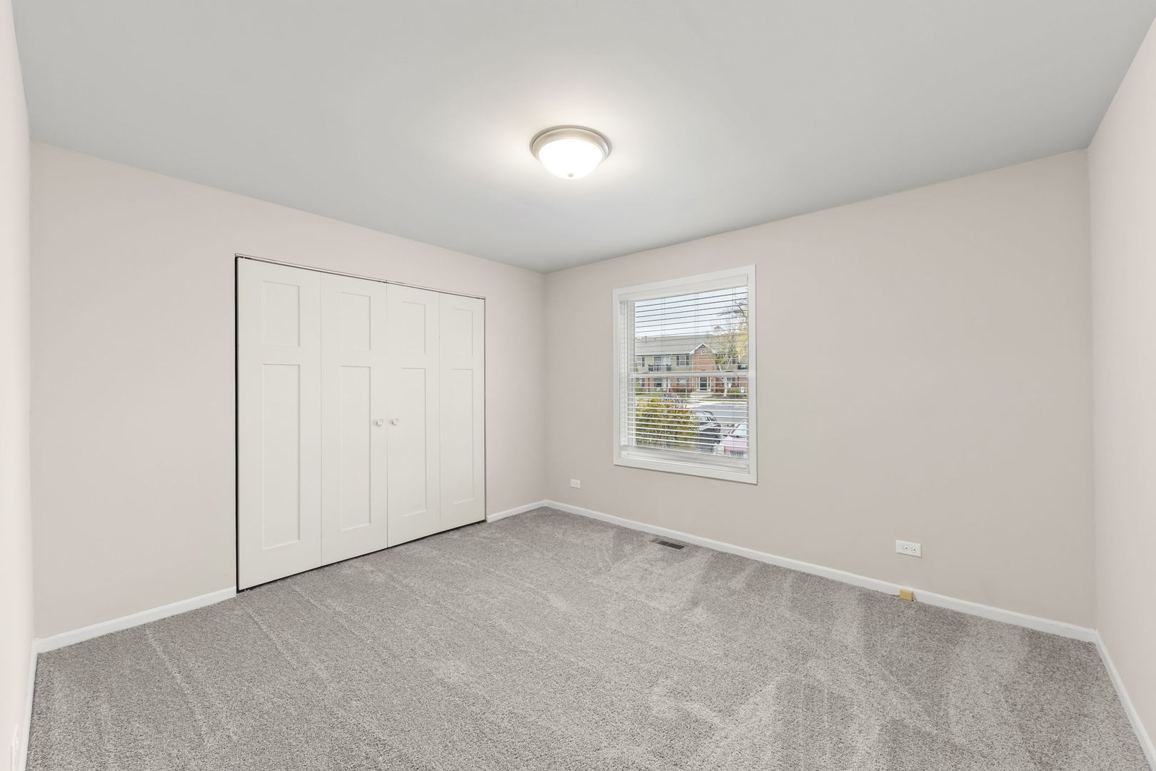 1324 McDowell Road, Unit 104 Naperville, IL 60563 - Photo 8 of 20 an empty room with a empty space and windows