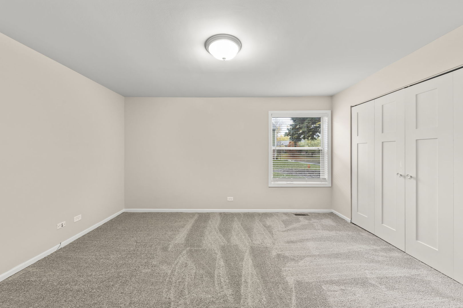 1324 McDowell Road, Unit 104 Naperville, IL 60563 - Photo 10 of 20 an empty room with windows