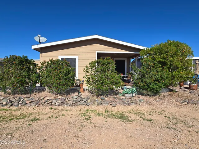 a view of a car in front of a house