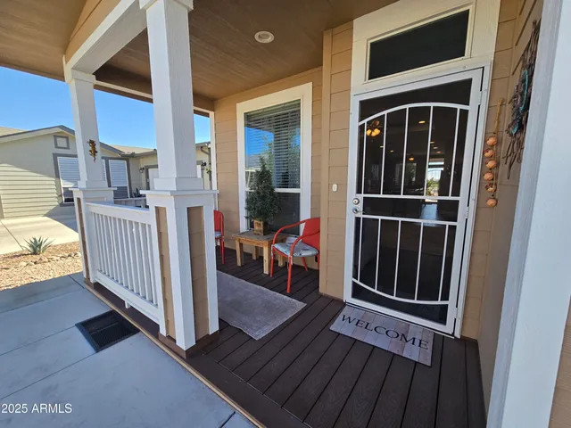 a view of a pathway both side of house