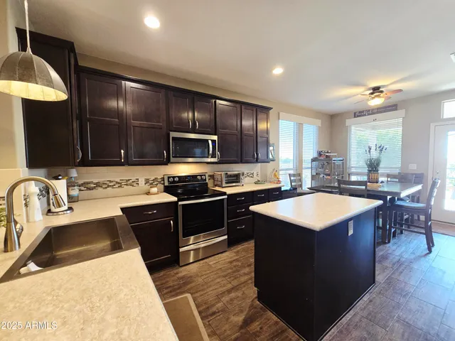 a utility room with a sink a washer and dryer