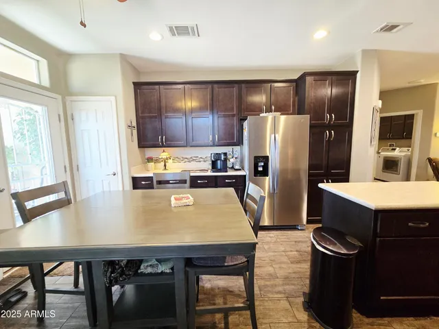 a view of swimming pool and sitting area