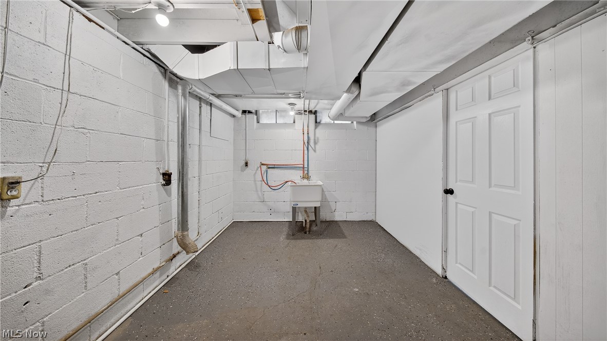 16811 Invermere Avenue Cleveland, OH 44128 - Photo 45 of 47 Unfinished below grade area featuring a sink