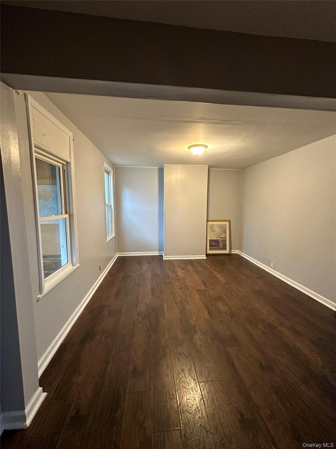 39 Spruce Street Poughkeepsie, NY 12601 - Photo 2 of 11 a view of empty room with wooden floor