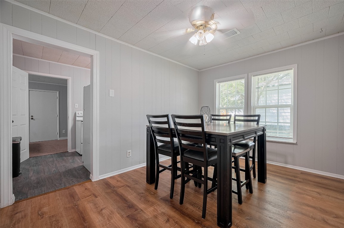 16128 1/2 Ridlon Street Channelview, TX 77530 - Photo 12 of 43 The dining area basks in sunlight from a large window and connects to the kitchen—perfect for everyday meals or entertaining with ease.