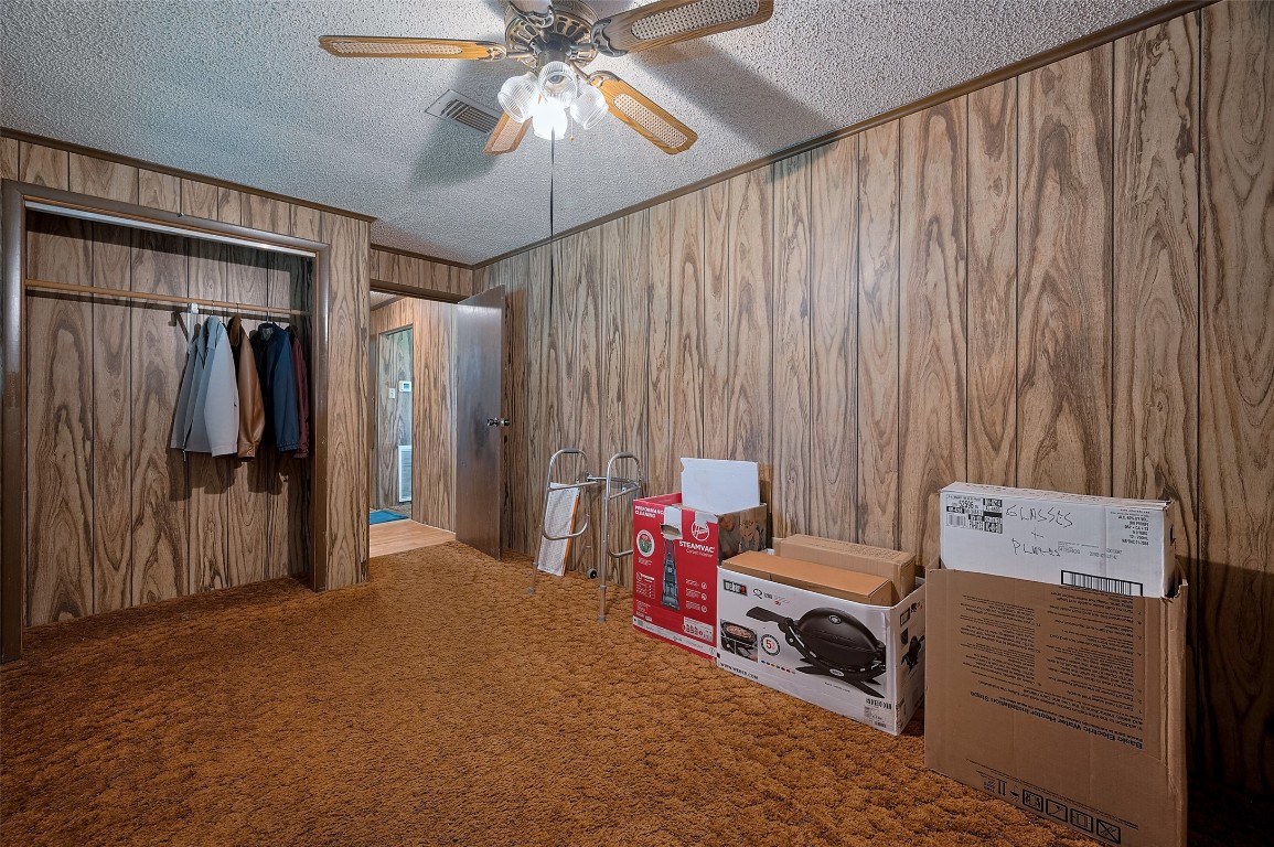 16128 1/2 Ridlon Street Channelview, TX 77530 - Photo 35 of 43 Another bedroom, also carpeted, includes a built-in closet and room to stretch out—well-suited for tenants, guests, or work-from-home needs.