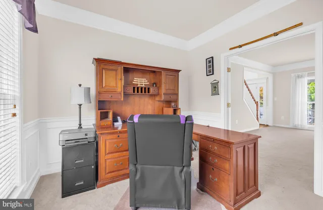 a view of a kitchen from the hallway