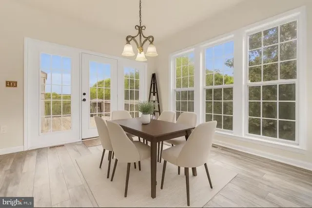 a view of a balcony with wooden floor