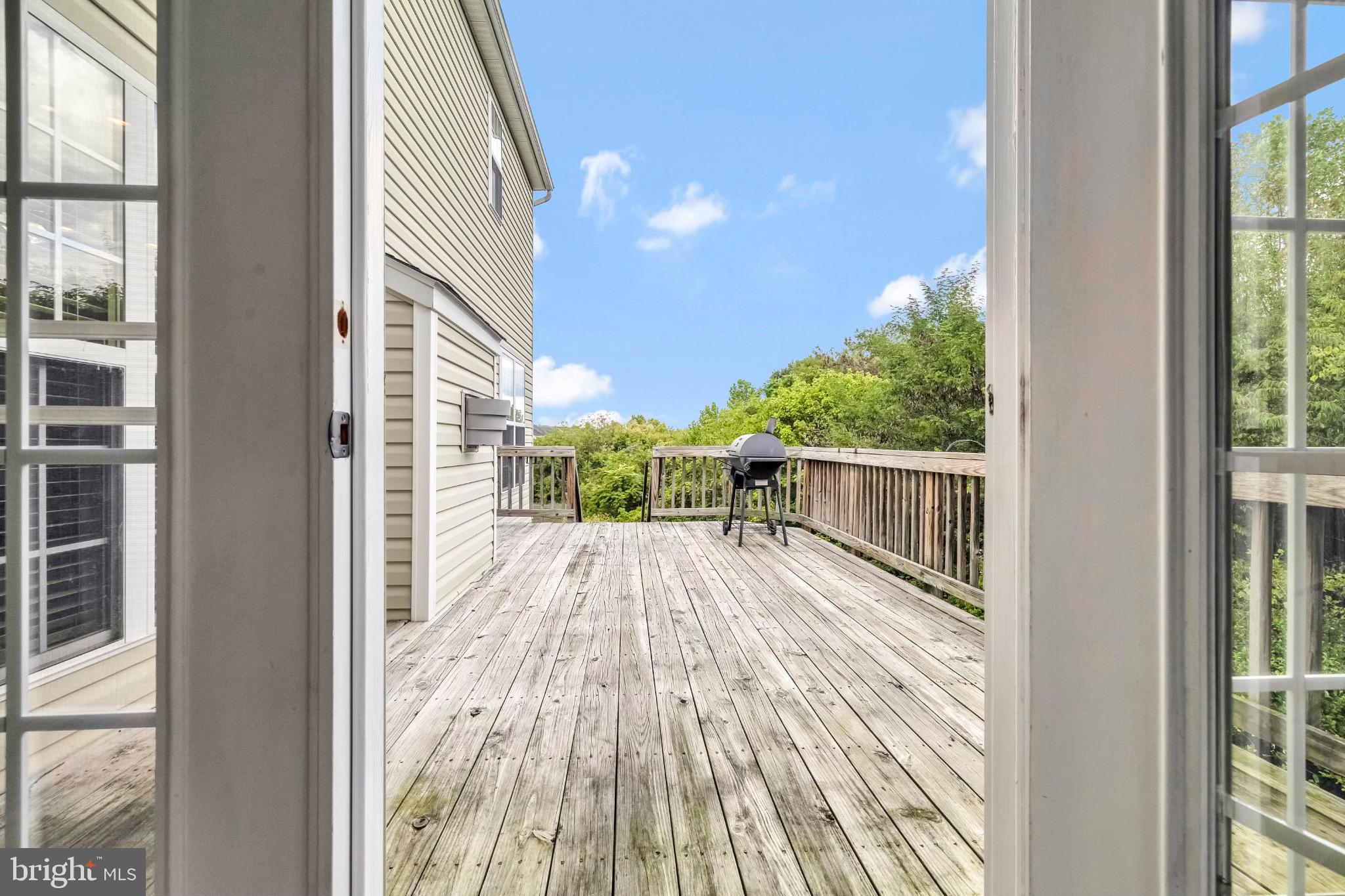 12 Evan Court Brunswick, MD 21758 - Photo 18 of 39 a view of a balcony with wooden floor