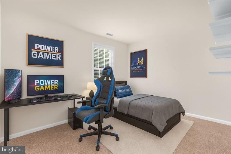 12 Evan Court Brunswick, MD 21758 - Photo 28 of 39 a bedroom with a bed and a chair