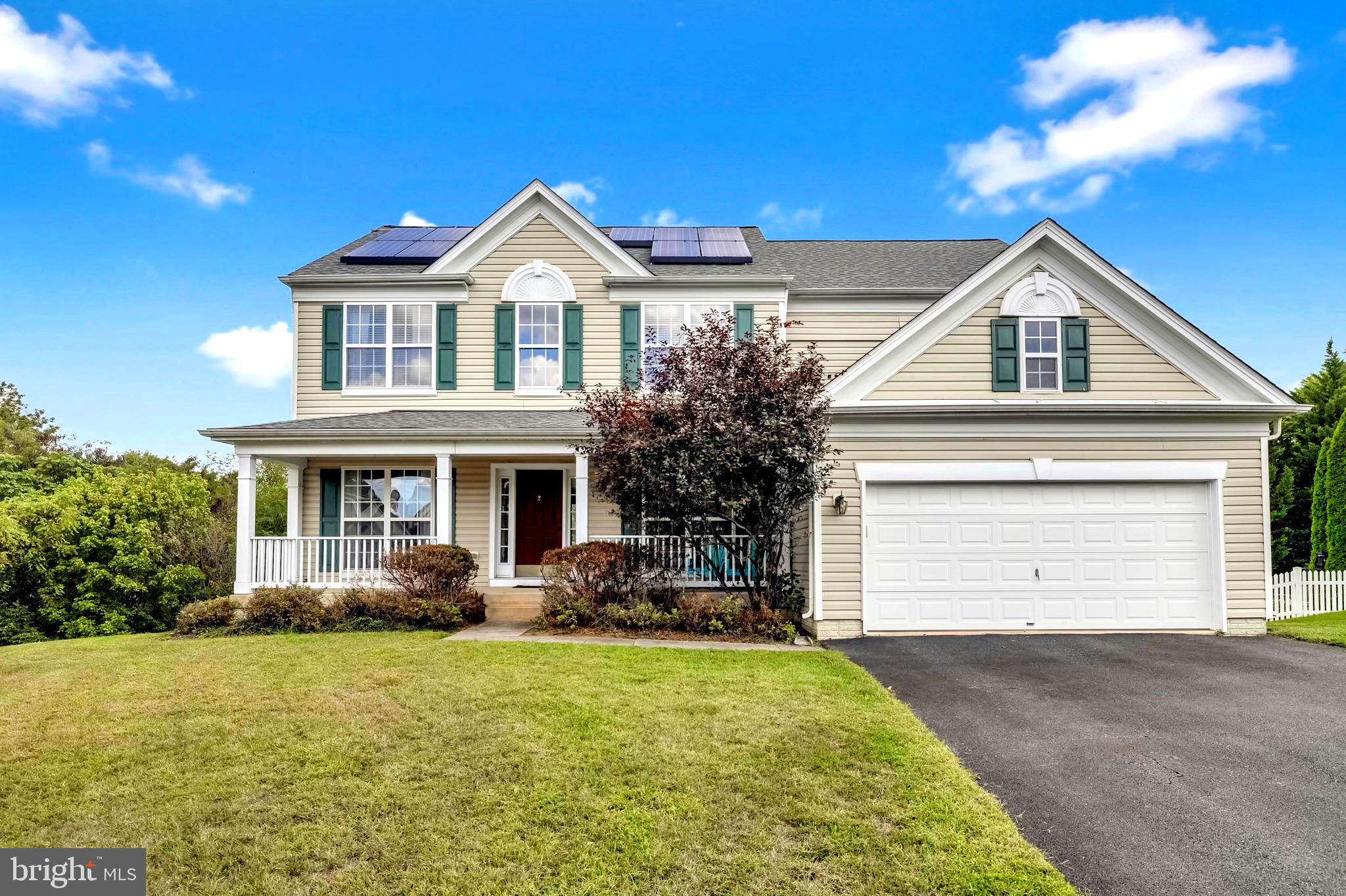 12 Evan Court Brunswick, MD 21758 - Photo 3 of 39 a front view of house with yard and green space