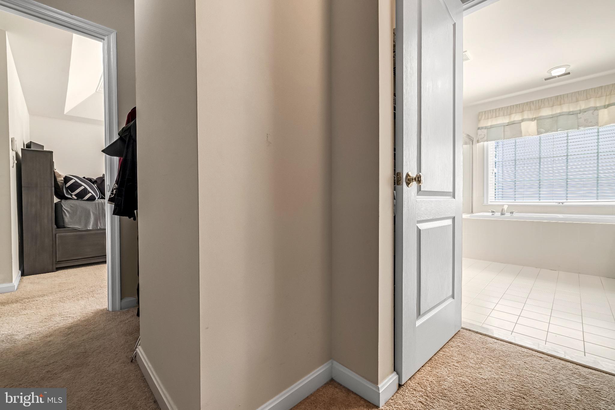 12 Evan Court Brunswick, MD 21758 - Photo 33 of 39 a view of a hallway with a livingroom and a bathroom