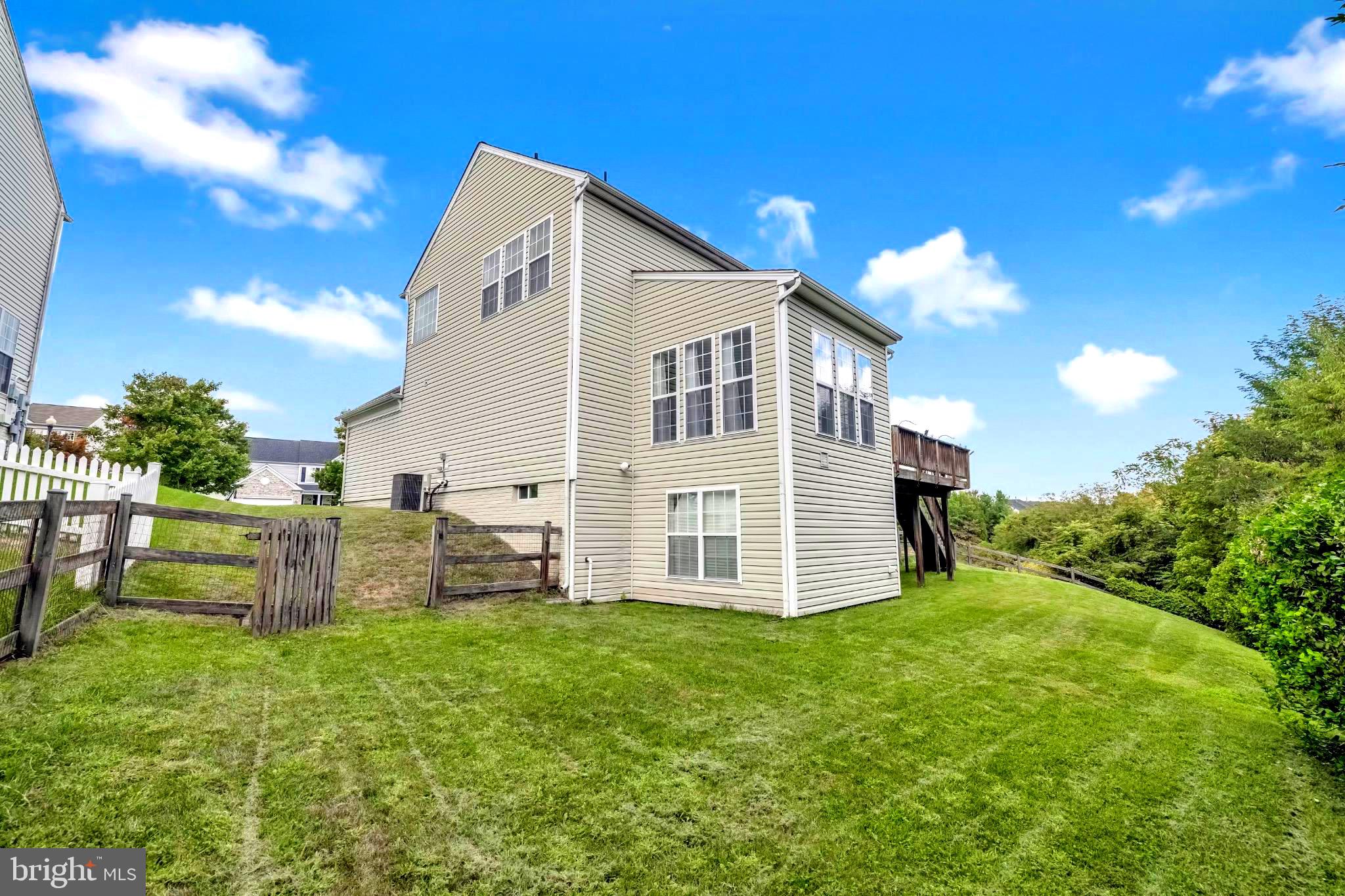 12 Evan Court Brunswick, MD 21758 - Photo 37 of 39 a view of a house with backyard and sitting area