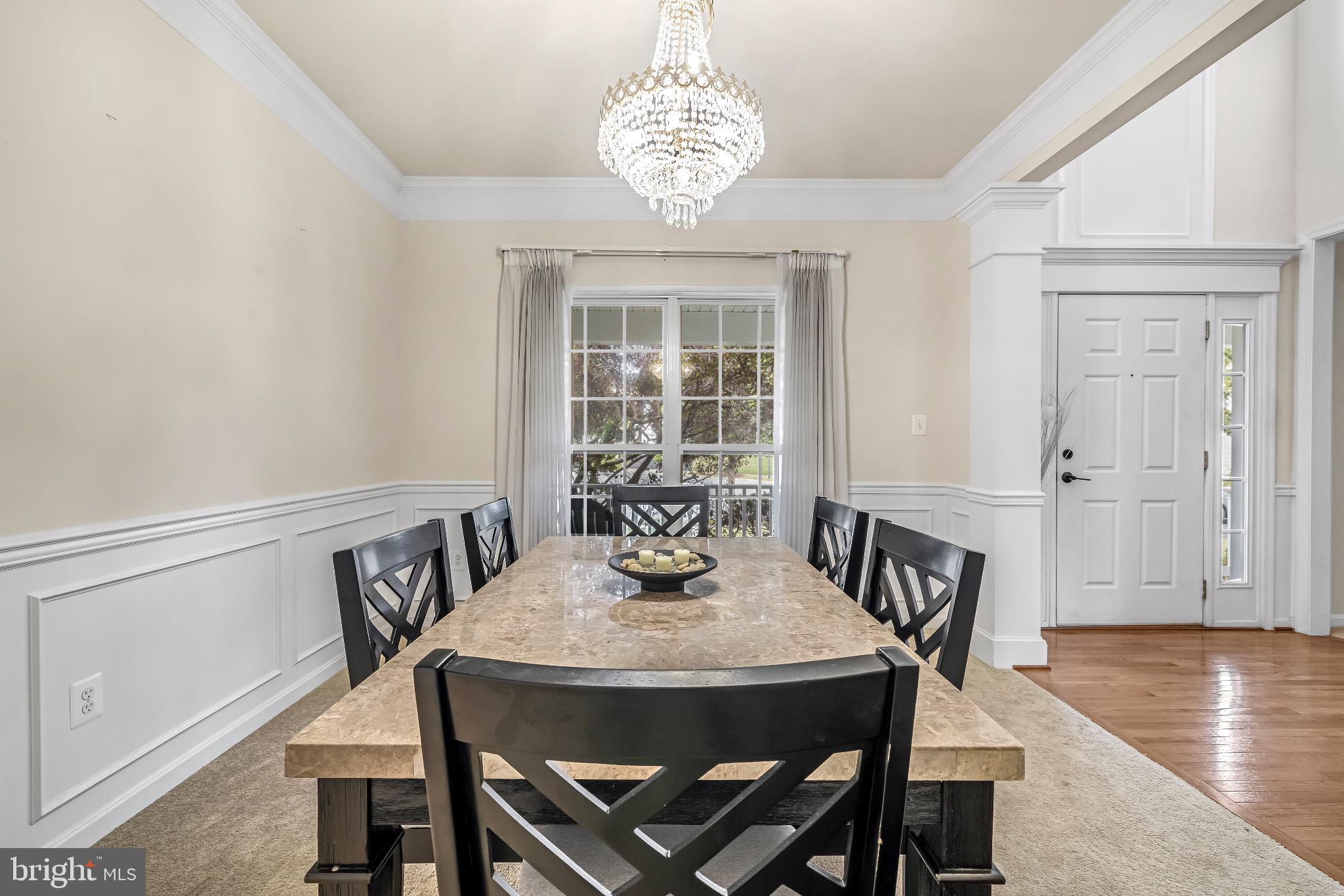 12 Evan Court Brunswick, MD 21758 - Photo 6 of 39 a view of a dining room with furniture window and wooden floor