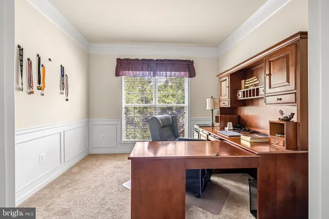 a room with furniture a mirror and wooden floor