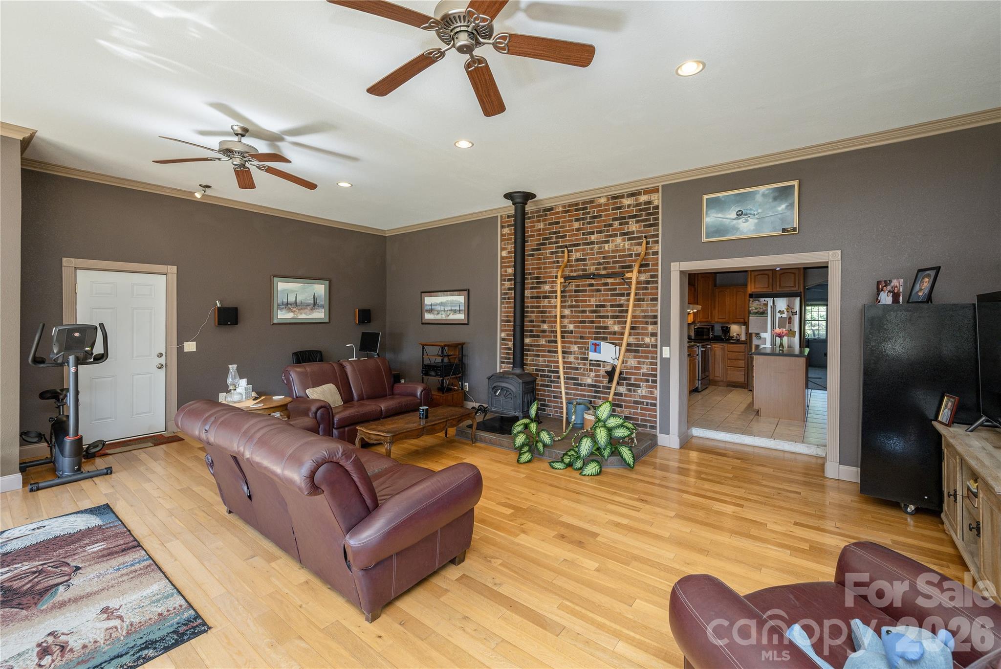231 Allen Road East Flat Rock, NC 28726 - Photo 11 of 42 a living room with furniture and a flat screen tv