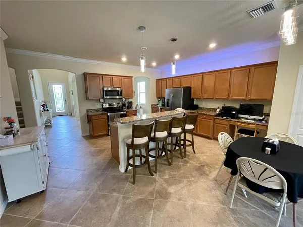 a view of a dining room with furniture