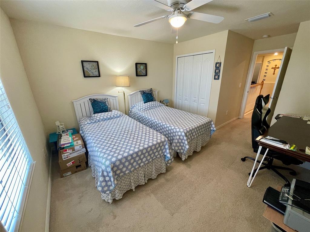20940 Valore Court Venice, FL 34293 - Photo 23 of 52 a bedroom with bed and a window